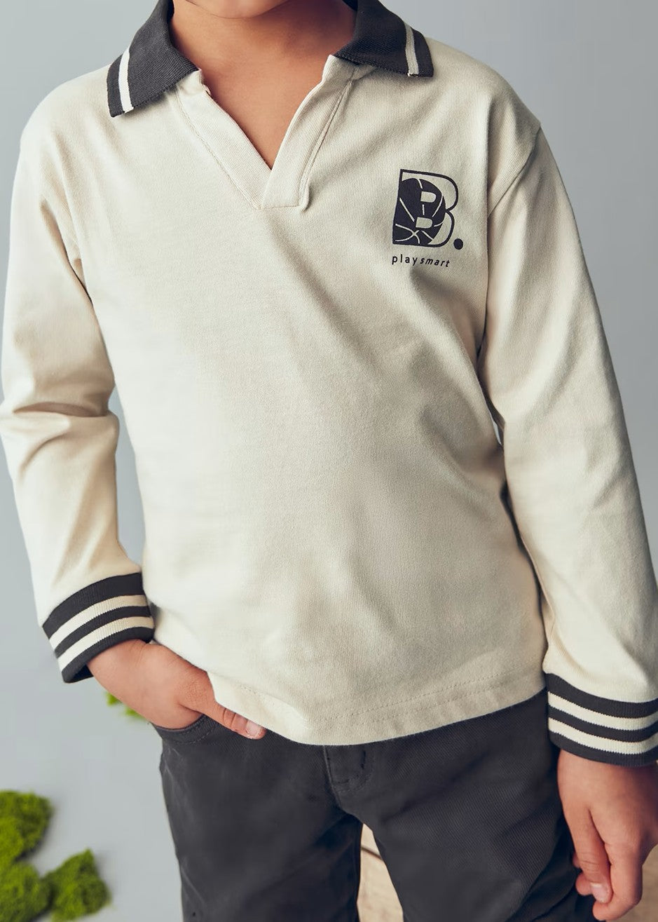 Polo patentes manga larga
